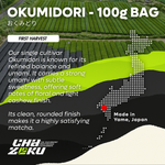 Advertisement for Cha Zoku Okumidori matcha with fields and branding elements.