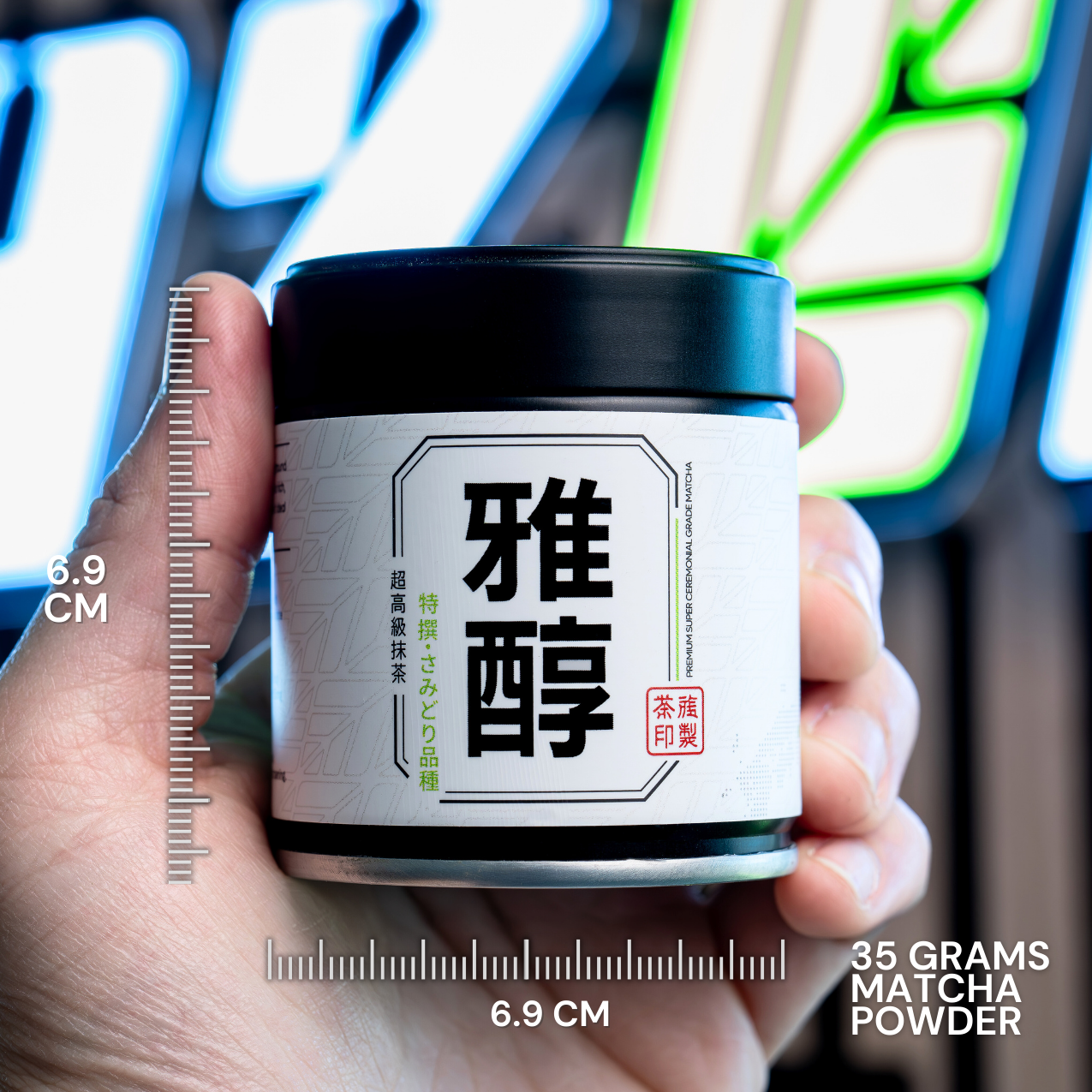 Hand holding a container of matcha powder with measurement details against a neon sign background
